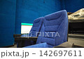 Blue spectator seats installed in renovated hall of cinema 142697611