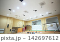Energy-efficient lighting equipment on ceiling of large hall 142697612