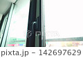 Modern metal plastic window with black frame and handle 142697629