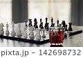 Close-up chess pieces are in the process of playing. 142698732