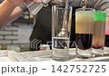 Four Colorful Shots Prepared for a Party and Celebration at a Modern Bar 142752725