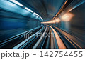 4K First-person view moving through modern underground transit tunnel with fast speed and motion blur background 142754455