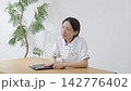 Female white coat 142776402