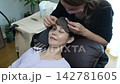 Women getting back hair removal 142781605