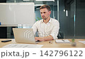 Professional Businessman Working On Laptop Smiles 142796122