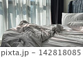 Heavily Crumpled Bed Sheets After Restless Night Sleep in Morning Light. Slider motion cinematic shot 142818085