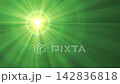 A vibrant scene showcasing green sunlight rays erupting from a bright sunburst, with atmospheric particles creating a luminous and dynamic light display. 142836818