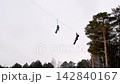 Zip-line ropes in winter adventure rope park 142840167