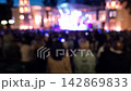 Blurred view of a spectacular evening concert with an enthusiastic audience, 142869833