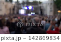 blurry view of the crowd gathered for a live performance  142869834