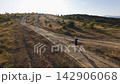 Trail running drone footage determined female athlete solo athletic pursuit 142906068