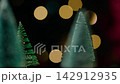 snowy trees with flashing lights background  142912935