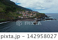 Aerial view of Seixal coastal village, volcanic black sand beach and natural pools in Madeira, Portugal. 142958027