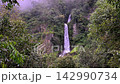 Scenic Huai Nam Yen Waterfall cascading through lush tropical rainforest in the rainy season in Omkoi District Chiang Mai, Thailand 142990734