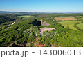Experience the vastness of Velka Amerika, an abandoned limestone quarry near Prague. Surrounded by rich greenery, this location offers stunning views and a glimpse into nature's reclamation. 143006013