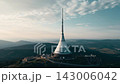 Witness breathtaking sunset vistas from Jested Mountain, featuring the iconic tower and hotel in Liberec, Czechia. Drone shots showcase the surrounding landscape in golden hues. 143006042
