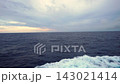 A panoramic view of the vast ocean from a ship sailing across the Pacific Ocean at dusk, kicking up spray (voyage, sea voyage, immersive, 17 seconds) 143021414