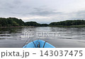 fishing boat slowly floats down the river 143037475