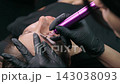 Permanent Makeup Artist Performing Eyebrow Tattoo 143038093