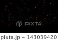 Orange particles of light floating against a black background 143039420