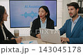 Portrait of young multiethnic business team prepares AI assistant release in boardroom. Marketing experts with Asian woman leader discuss smart technology 143045178