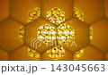 Translucent honeycomb illuminated by warm sunlight. Golden sun rays shine through natural wax cells 143045663