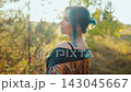 Beautiful Woman With Turquoise Hair and Silk Kimono in Pine Forest. portrait with natural light 143045667