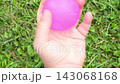 ASMR Pink Water Balloon Squeezed and Stretched by Hand 143068168