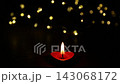 Red Heart Diya Candle Flame with Drifting Gold Bokeh Particles 143068172