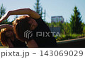 Elderly women practicing mindful outdoor Pilates together in slow motion, focusing on graceful 143069029