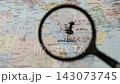 Magnifying glass highlights Jiddah on a map 143073745