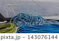 marine winch and ropes of sailing boat in the rain, sailing at rainy weather, different colors 143076144