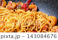 Fresh shrimp noodle stir-fry served directly in a hot pan 143084676