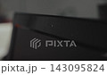 Closeup of human finger opening and closing built in privacy shutter on portable computer webcam, crucial measure for ensuring online safety, preventing spying, maintaining digital confidentiality. 143095824