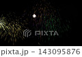 Grand festive fireworks display and pyrotechnics with rocket launches and multi-color bursts on black background, overlay footage for Screen or Add blend mode. 143095876