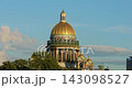 the golden dome of St. Isaacs Cathedral, the colonnade, English Embankment during sunset, the Neva River 143098527