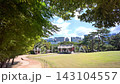 Scenic view of Seonjeongneung Royal Tombs and Jeongjajak with modern cityscape in Seoul 143104557