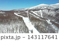 Chairlift Crossing a Snow Covered Ski Slope in Winter in Japan 143117641