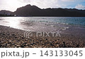 A fantastical scene of the sea surface and shoreline sparkling in the morning sun at Omura Beach on Chichijima Island in the Ogasawara Islands (backlit, 23 seconds). 143133045
