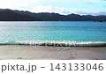 A head-on view of the beautiful, clear waves lapping against the sandy shore at Omura Beach on Chichijima Island in the Ogasawara Islands (Bonin Blue, 28 seconds). 143133046