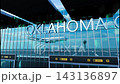 Airlane landing at Oklahoma City, USA. Arrival in the city with reflection of airport and aircraft 143136897