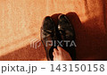 Men classic elegant black shoes Male fashion. male hands take shoes out of frame 143150158