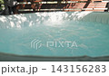 Bubbling Water in Inflatable Hot Tub with Spa Jets 143156283
