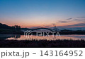 4K Night-to-day timelapse video of  sunrise timelapse of Misaeng Bridge in Siheung Gaetgol Ecological Park wetland, South Korea 143164952