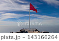 Red Turkish flag on mountain summit viewpoint above clouds - outdoor 143166264