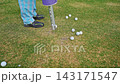 Golf Ball Shagger tube. A man collects golf balls from the course at the end of a game 143171547