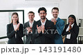 Positive multicultural team with bearded Middle Eastern boss applaud in workspace. Happy colleagues group celebrates business achievement in company office 143191480