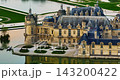 Aerial view of the magnificent French Castle de Chantilly and its picturesque park at sunset near Paris, France 143200422