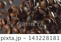 Coffee beans falling through the air in super slow motion black background 143228181