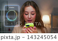 Caucasian Woman Talking to Voice AI Assistant Hologram Interface on Mobile Screen. Female Holding Smartphone while Interacting with Digital Sound Wave Interface for Online Search and Data Analysis 4k 143245054